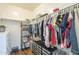 Walk-in closet with ample hanging space and shelving for organization at 2673 S Balsam Dr, Gilbert, AZ 85295