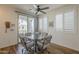 Bright dining area next to a sliding glass door with modern table and chairs at 2673 S Balsam Dr, Gilbert, AZ 85295