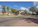 The Lakes at Annecy neighborhood entrance with landscaped median and water feature at 2673 S Balsam Dr, Gilbert, AZ 85295