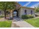 Attractive neighborhood entrance with a stone accent wall and manicured landscaping at 2673 S Balsam Dr, Gilbert, AZ 85295