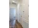 Clean and modern hallway with wood floors and white doors at 2673 S Balsam Dr, Gilbert, AZ 85295