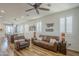 Comfortable living room with hardwood floors, plantation shutters, and stylish furnishings at 2673 S Balsam Dr, Gilbert, AZ 85295