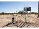 Exterior view of a well with electrical box in a desert landscape with sparse vegetation at 27141 E Javelina Dr, Florence, AZ 85132