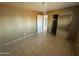 This room boasts tiled floors and a closet, ready for your creativity at 2837 W Almeria Rd, Phoenix, AZ 85009