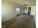 Bedroom with a large closet and a window providing natural light at 2837 W Almeria Rd, Phoenix, AZ 85009