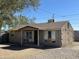 Charming bungalow-style home with a covered porch, desert landscaping, and neutral tones at 2837 W Almeria Rd, Phoenix, AZ 85009