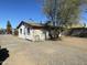 Exterior back view of the house with a shed-like structure attached at 2837 W Almeria Rd, Phoenix, AZ 85009