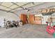 Spacious two-car garage featuring ample storage and workshop space at 2861 E Camellia Dr, Gilbert, AZ 85296