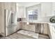 Beautiful modern kitchen with stainless steel appliances, ample counter space, and farmhouse sink at 2861 E Camellia Dr, Gilbert, AZ 85296