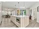 Bright, open kitchen featuring a large island with built-in microwave and pendant lighting at 2861 E Camellia Dr, Gilbert, AZ 85296