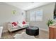 Comfortable living room with stylish furnishings, neutral colors, and ample natural light, great for relaxing at 2861 E Camellia Dr, Gilbert, AZ 85296