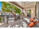 Covered patio with ceiling fan and lounge chairs overlooking the pool area at 2861 E Camellia Dr, Gilbert, AZ 85296