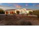 Elegant single-story home with a three-car garage, desert landscaping, and a beautiful red tile roof at 28714 N Verde River Way, Rio Verde, AZ 85263