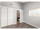 Neutral bedroom featuring a large closet and en suite bathroom at 4205 N 3Rd Ave, Phoenix, AZ 85013