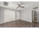 Well lit living room offering modern ceiling fan and hardwood floors at 4205 N 3Rd Ave, Phoenix, AZ 85013