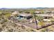 Aerial view of a home with fenced-in backyard, pool, and desert landscaping at 42429 N Cross Timbers Ct, Anthem, AZ 85086