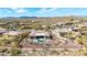 Aerial view of backyard and neighborhood featuring a pool and patio area at 42429 N Cross Timbers Ct, Anthem, AZ 85086