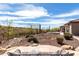 Expansive backyard with low maintenance desert landscaping, and distant mountain views at 42429 N Cross Timbers Ct, Anthem, AZ 85086