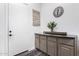 Entryway with white door, console table, decor and a stylish rug at 42429 N Cross Timbers Ct, Anthem, AZ 85086