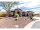 Beautiful desert home with xeriscaping, native plants and a three car garage at 42429 N Cross Timbers Ct, Anthem, AZ 85086