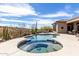 Sparkling pool and spa with hillside views in the beautiful backyard at 42429 N Cross Timbers Ct, Anthem, AZ 85086