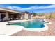 Resort-style pool featuring integrated spa and picturesque hillside views at 42429 N Cross Timbers Ct, Anthem, AZ 85086