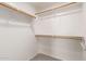 A closet with custom shelving is great for home organization and storage at 4245 S 247Th Dr, Buckeye, AZ 85326