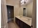 Bathroom featuring double sinks, tile flooring, and a tub/shower combo at 4529 S Granite St, Gilbert, AZ 85297