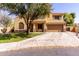 Inviting two-story home featuring a desert-landscaped front yard and a spacious two car garage at 4529 S Granite St, Gilbert, AZ 85297