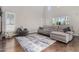 Bright living room with hardwood floors, recessed lighting, and lots of natural light at 4529 S Granite St, Gilbert, AZ 85297