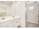 Bright bathroom with double sinks, a walk-in shower, and modern fixtures at 4642 W Suncup Dr, San Tan Valley, AZ 85144