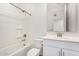 Clean bathroom featuring a shower-tub combo, white vanity with storage, and a neutral color scheme at 4642 W Suncup Dr, San Tan Valley, AZ 85144