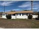 Nice exterior view of a single-story home with well-maintained front yard landscaping at 5000 W Osborn Rd, Phoenix, AZ 85031