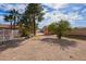 View of backyard with shed and tree at 6208 W Willow Ave, Glendale, AZ 85304