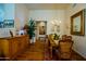 Cozy dining room with a wooden table, chandelier, and decorative accents at 7016 E Stone Raven Trl, Scottsdale, AZ 85266