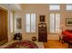 Inviting living room features hardwood floors, lots of natural light, and traditional furnishings at 7016 E Stone Raven Trl, Scottsdale, AZ 85266