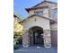 Close-up of front porch showing stone supports and gated front entrance at 7253 E Nathan St, Mesa, AZ 85207