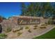 Las Sendas community entrance sign with stone and desert landscaping at 7253 E Nathan St, Mesa, AZ 85207