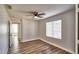 Bright bedroom with modern ceiling fan and a large window providing plenty of natural light at 7259 W Tina Ln, Glendale, AZ 85310