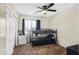 Cozy bedroom featuring a bunk bed, plush carpeting, and neutral walls offering a comfortable space at 7703 S 68Th Dr, Laveen, AZ 85339