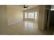 Bedroom featuring tile flooring, a ceiling fan, and lots of natural light at 7728 W Via Montoya Dr, Peoria, AZ 85383