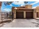 Garages with tile roofs and gated access at 8231 N 21St Dr # E101, Phoenix, AZ 85021