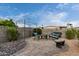 Backyard featuring paver patio area with seating and rock landscape at 9340 E Sun Lakes S Blvd, Sun Lakes, AZ 85248