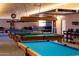 Community game room with multiple billiards tables and seating, creating a fun and social gathering space at 9340 E Sun Lakes S Blvd, Sun Lakes, AZ 85248