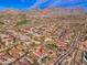 Aerial view of a neighborhood featuring desert landscaping and stunning mountain views at 9565 E Mountain Spring Rd, Scottsdale, AZ 85255