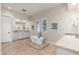 Bright primary bathroom with double sink vanity, soaking tub and shuttered arched windows at 9565 E Mountain Spring Rd, Scottsdale, AZ 85255