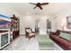 Inviting living room featuring vintage decor, light hardwood floors, and warm color palette at 9565 E Mountain Spring Rd, Scottsdale, AZ 85255