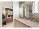 Stylish bathroom featuring granite countertops, modern fixtures, and a decorative-tiled backsplash at 9820 E Thompson Peak Pkwy # 629, Scottsdale, AZ 85255