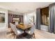 Stylish dining room featuring a large table with seating for eight and a built-in entertainment unit at 9820 E Thompson Peak Pkwy # 629, Scottsdale, AZ 85255