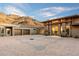 Contemporary home with a desert landscape, mountain backdrop and ample parking at 9820 E Thompson Peak Pkwy # 629, Scottsdale, AZ 85255